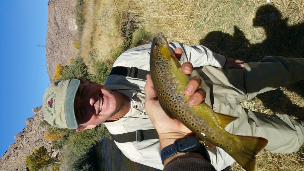 Happy client with a Beautiful Lower Owens River Brown Trout 